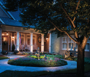 Landscape lighting Orlando - Residential outdoor lighting design on large home at sunset